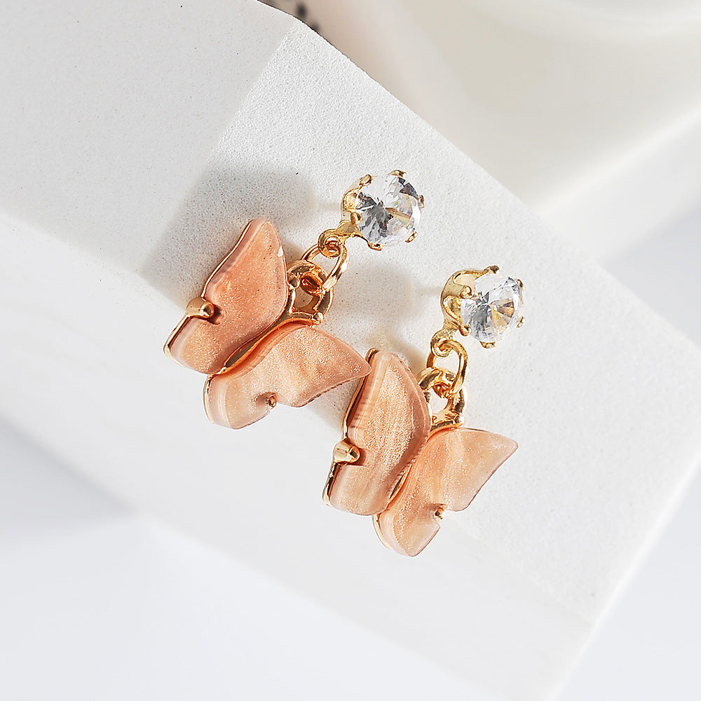 Pendientes de aleación de mariposa de acrílico de circón de color al por mayor